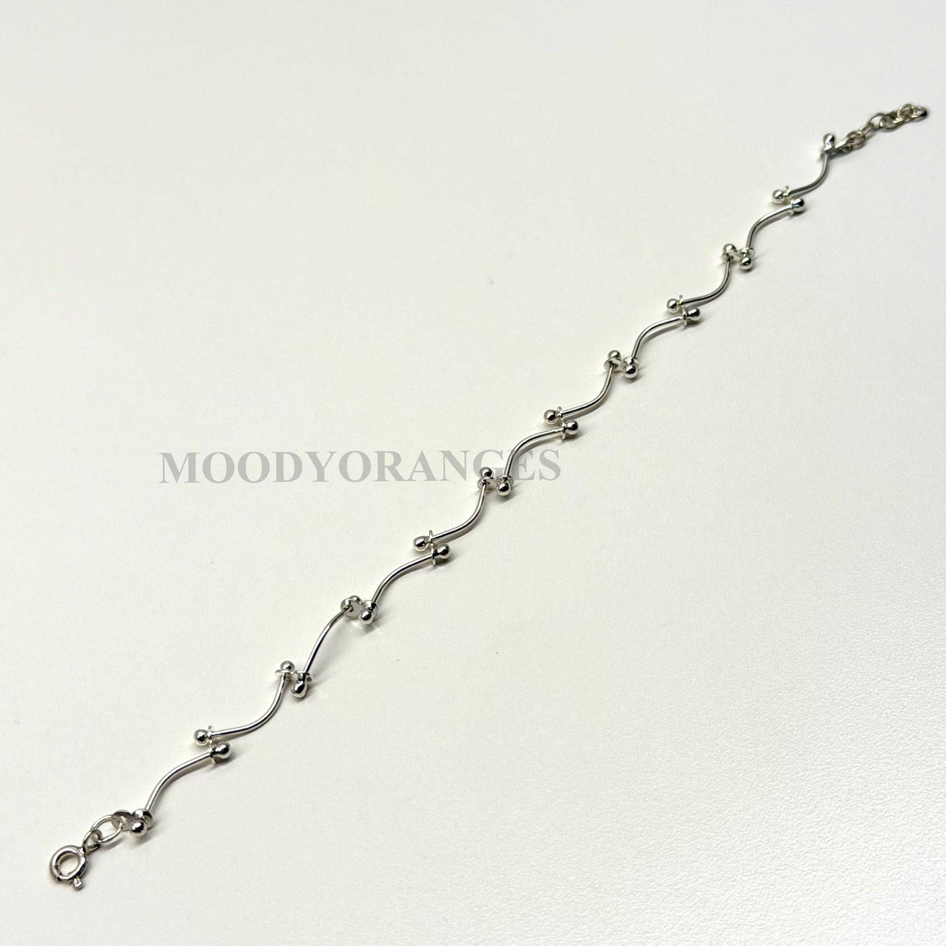 925 Silver - Curved Ball Bracelet - MOODY ORANGES